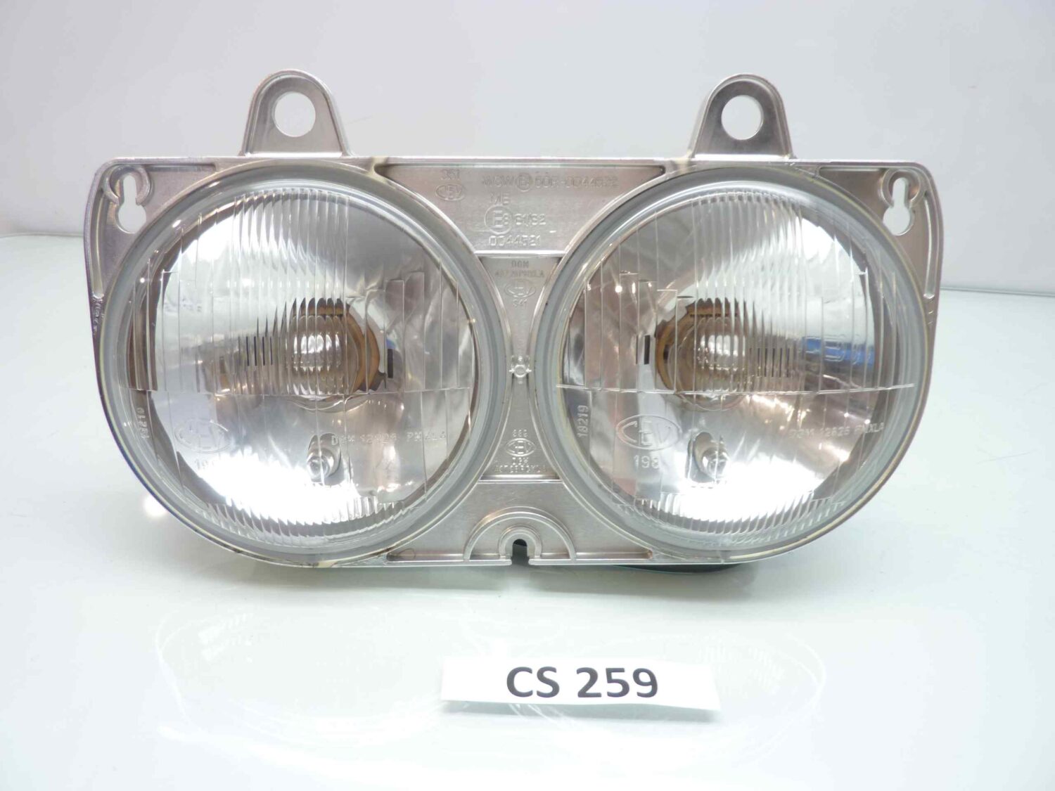 APRILIA AF1 125 SINTESI FARO ANTERIORE AP8112437 CEV 198 nuovo