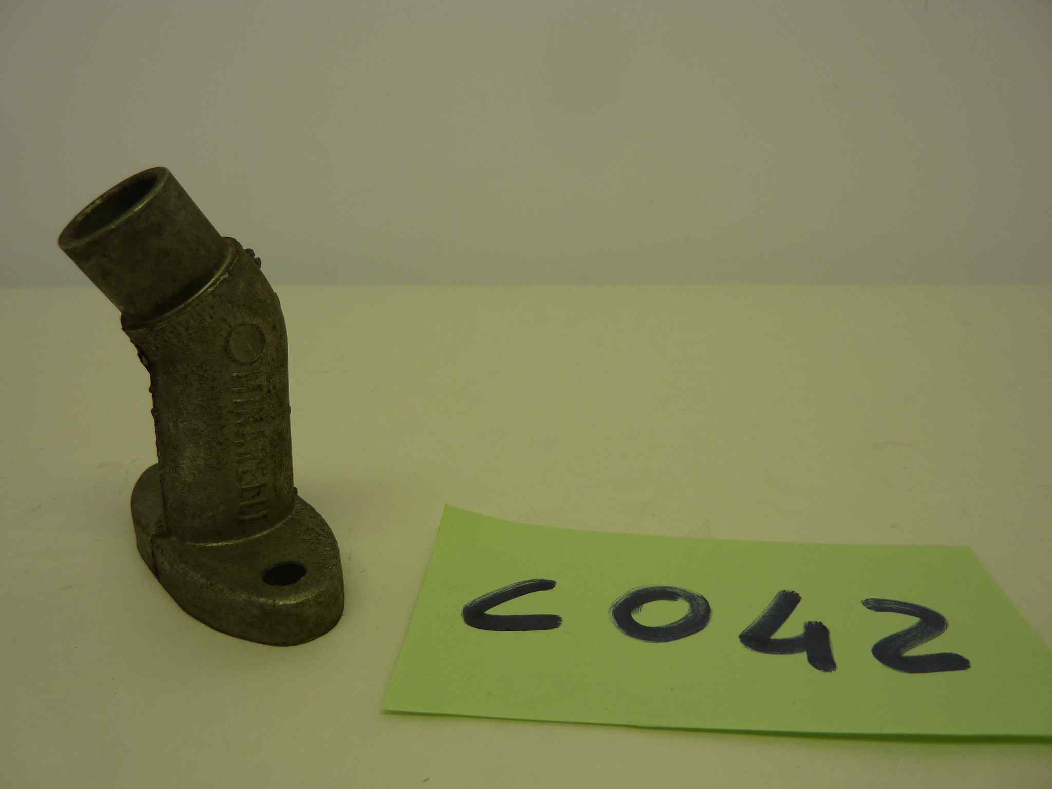 COLLETTORE CARBURATORE MINARELLI diam imbocco 18 mm int fori 46