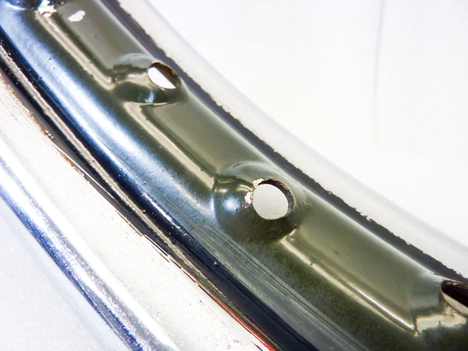 Cerchio acciaio 19 x 1,85 40 fori Beretta verniciato militare - diametro 510 mm - larghezza esterna canale 69,7 mm - interno canale 48,5 mm moto epoca nuovo fondo di magazzino - il prodotto puo' presentare imperfezioni, puntinature di ruggine, VEDI FOTO SE PRESENTI - immagine 5