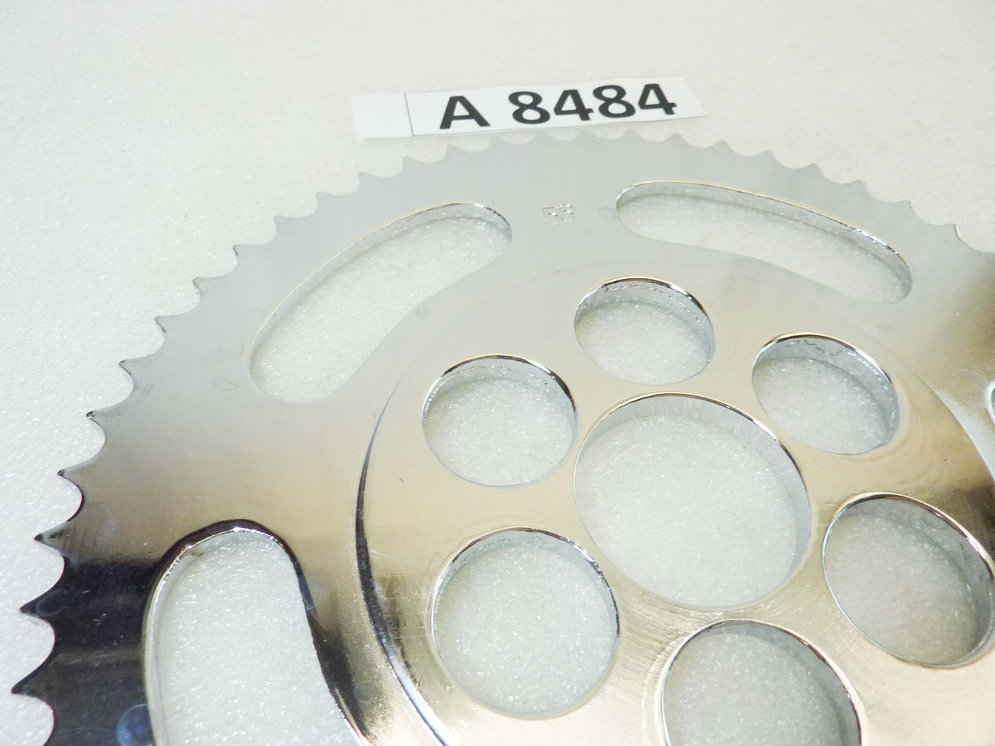 Corona cromata 56 denti passo 420 diam foro centrale 42 mm diam est 230 mm moto epoca Guzzi Gilera Benelli Motobi MV Agusta Morini Malaguti Ducati Cagiva Aprilia vari modelli NUOVO fondo di magazzino vedi foto leggi descrizione - immagine 2