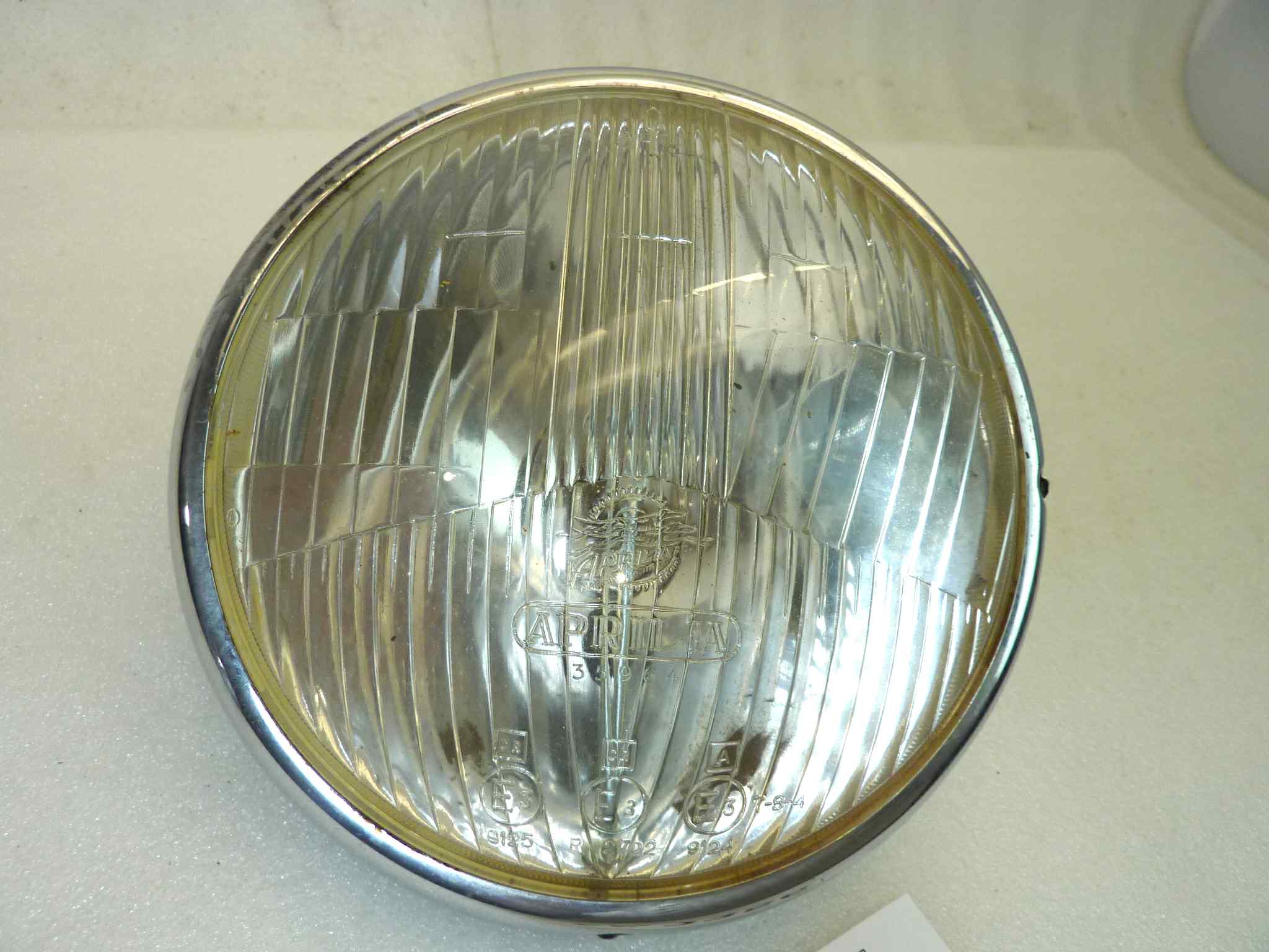 Gruppo ottico faro Aprilia 35964 9125 P 2722 9124 ghiera diam 195 mm vetro diam 170 mm - immagine 2
