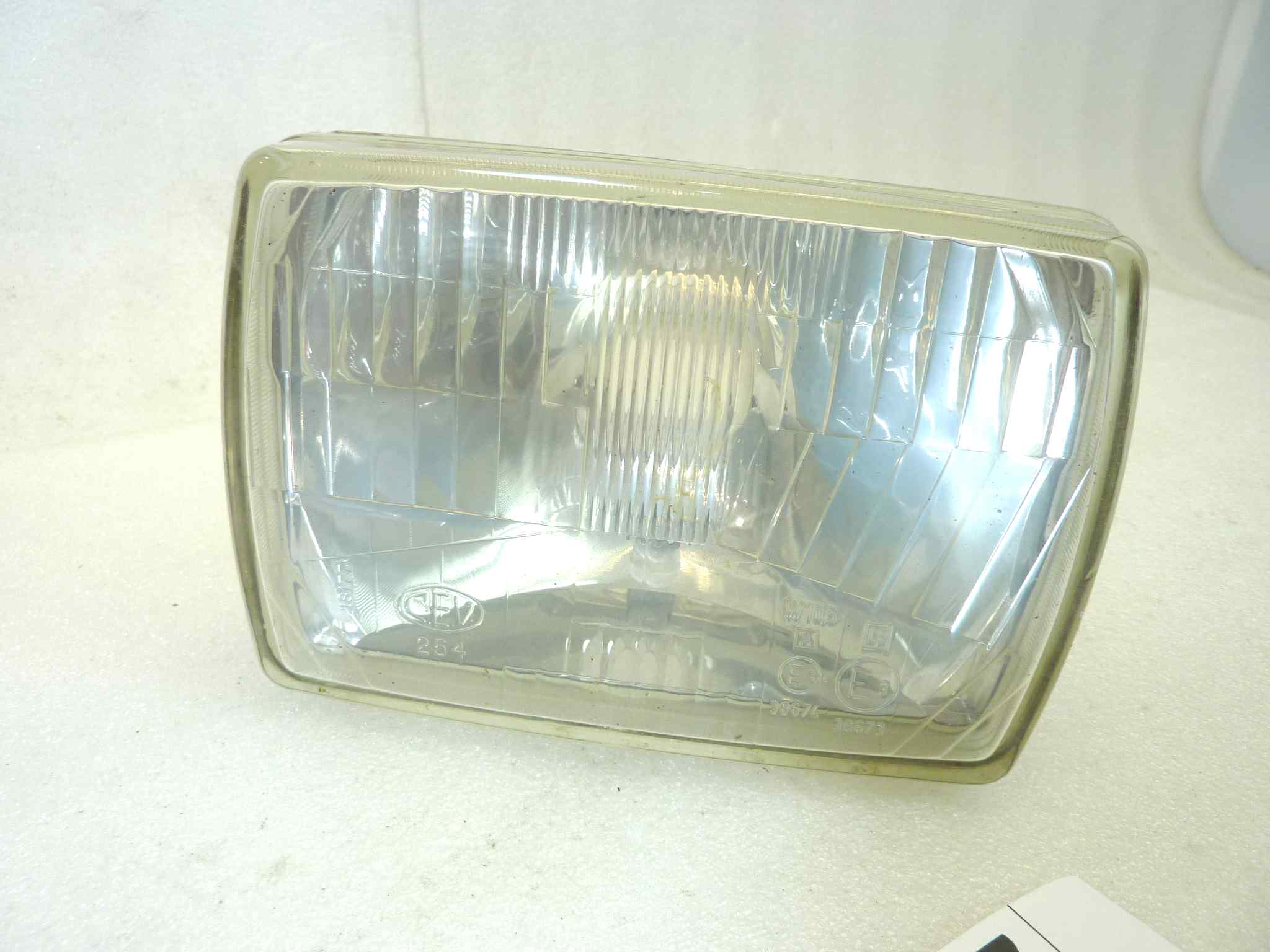 Gruppo ottico faro moto epoca vari modelli Guzzi Laverda Ducati Morini Cagiva Honda originale Cev 254 - immagine 2